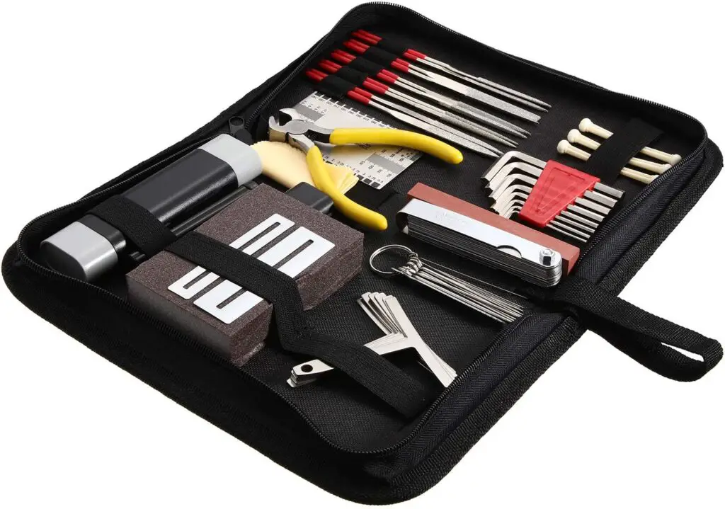 6359afdf0761f8250c51a374-42-pieces-guitar-tool-kit-complete